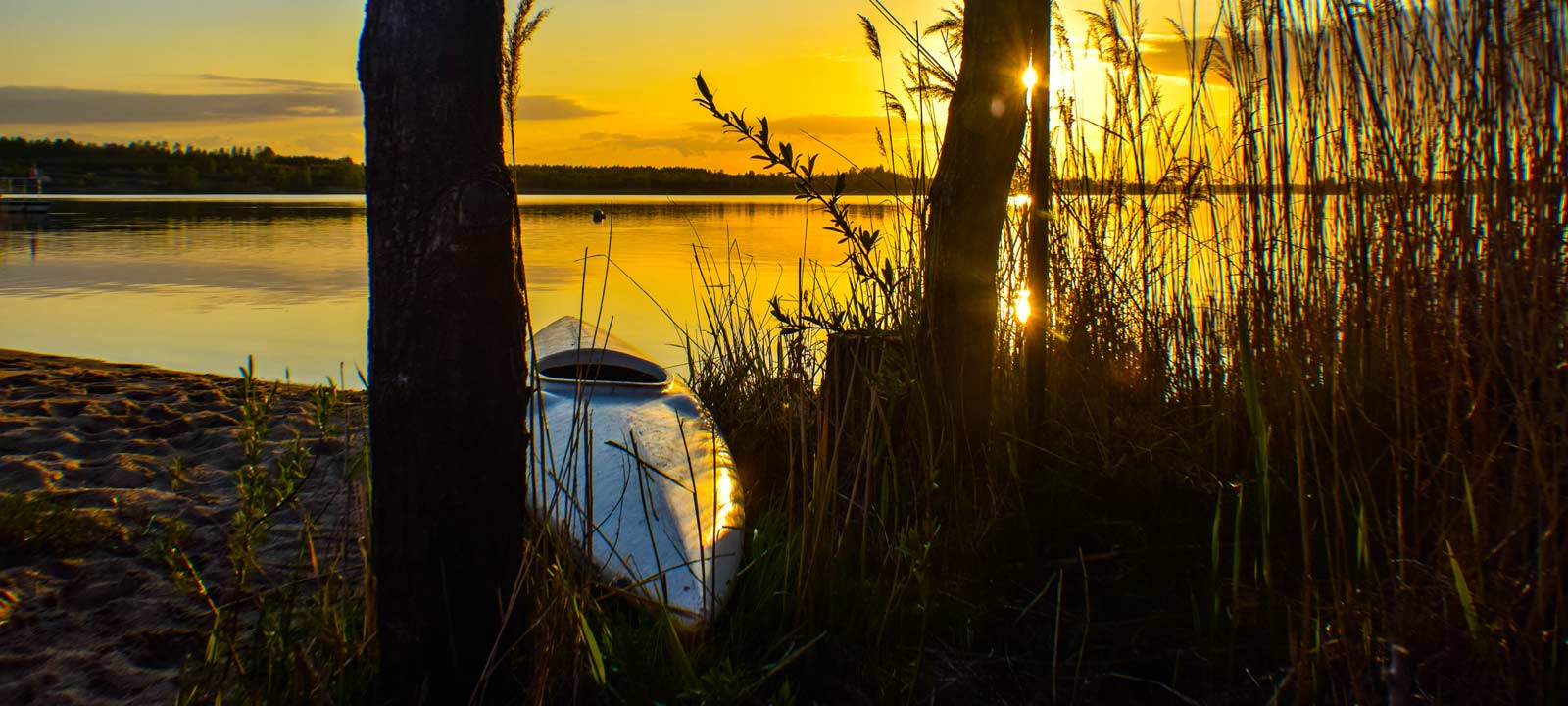 Kanu und Sonnenuntergang Markkleeberger See bei Leipzig